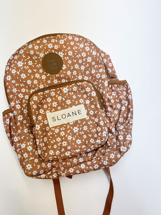 Add custom name to backpack
