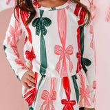 Wrapping Bows Peplum Top